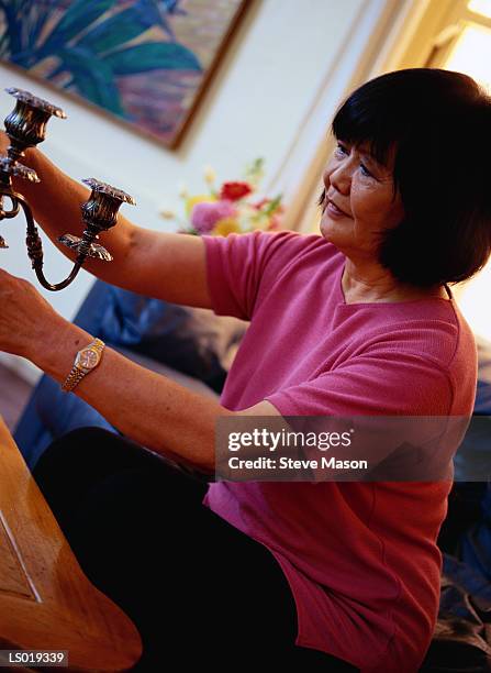 woman with candlestick - candlestick stock pictures, royalty-free photos & images