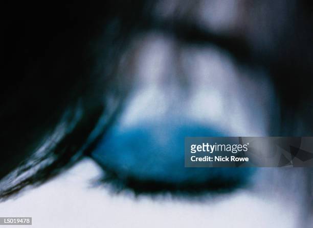 close-up of woman's eyelid - nick stock-fotos und bilder