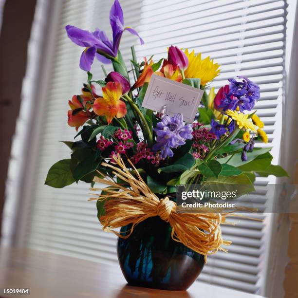 get well soon flowers - get ahead stock-fotos und bilder