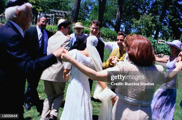 jewish bride and groom dancing - jewish wedding dancing stock pictures, royalty-free photos & images