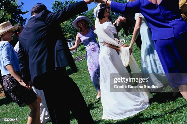 dancing around bride and groom - jewish wedding dancing stock pictures, royalty-free photos & images