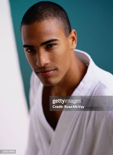 portrait of a serious man in a bathrobe - a serious man stock pictures, royalty-free photos & images