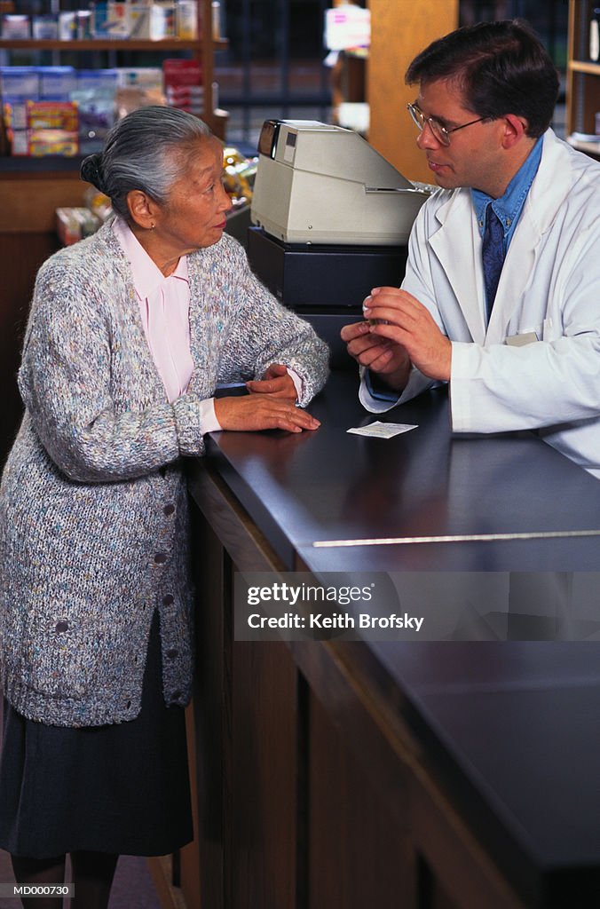 Woman Talking with a Pharmacist