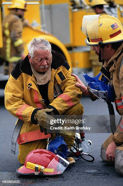 fireman suffering from smoke inhalation - regulator stock pictures, royalty-free photos & images