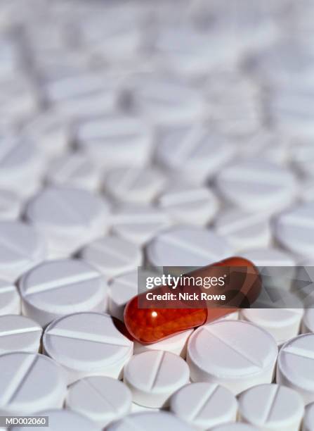 capsule on pills - nick stock pictures, royalty-free photos & images