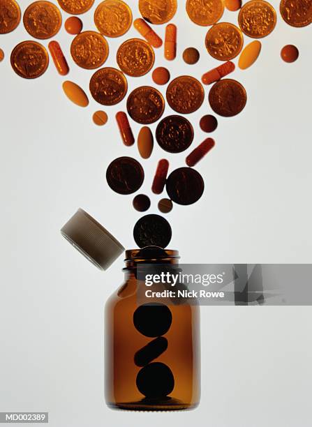 money, medicine and medicine bottle - nick stock pictures, royalty-free photos & images
