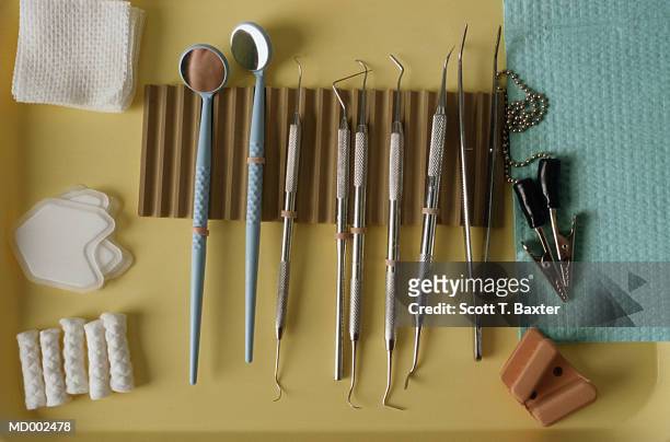 dental instruments in dentist office - rimotore di placca foto e immagini stock
