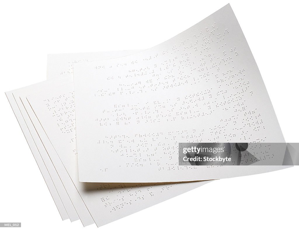 Pages with braille writing on them