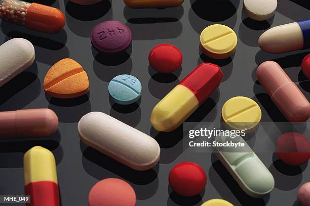 close-up of variety of pills - variety foto e immagini stock