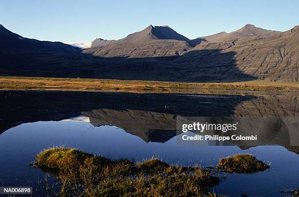 mountain reflection - reflection foto e immagini stock