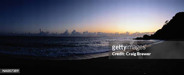 shell beach at sunset - lesser antilles foto e immagini stock