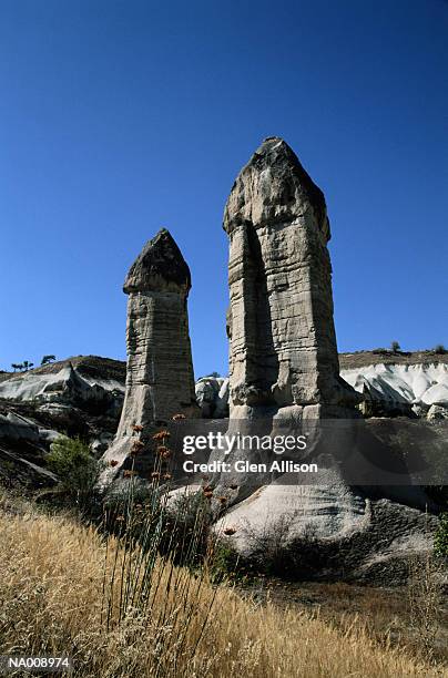 rock formations in cappadocia, turkey - vertical column stock pictures, royalty-free photos & images
