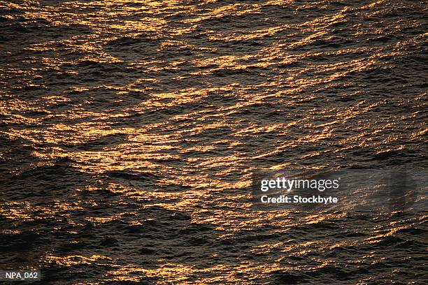 water surface with small waves - surfacing stock pictures, royalty-free photos & images