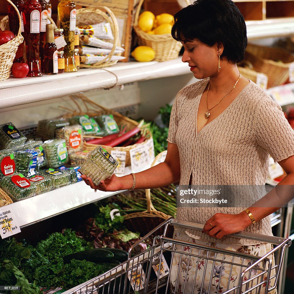 Woman shopping in produce section