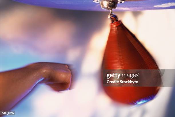 hand and punching bag - speed bag stock pictures, royalty-free photos & images
