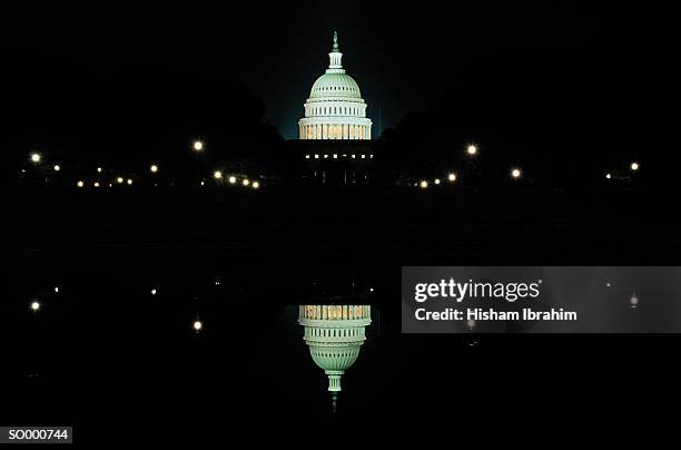 united states capitol at night - president obama delivers his last state of the union address to joint session of congress stockfoto's en -beelden