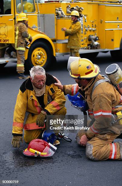 fireman suffering from smoke inhalation - regulator stock pictures, royalty-free photos & images