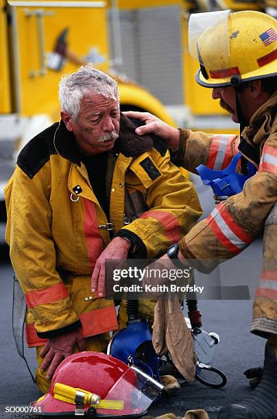 fireman suffering from smoke inhalation - regulator stock pictures, royalty-free photos & images