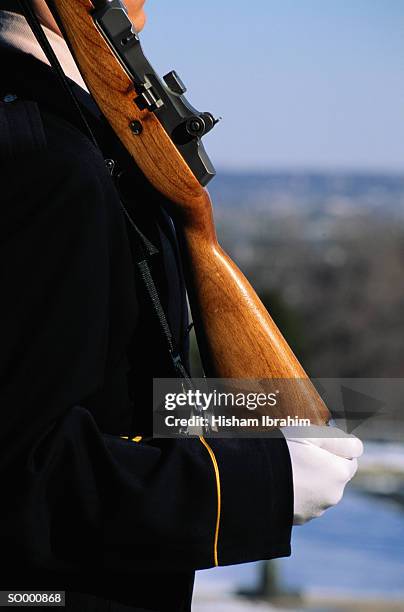 detail of soldier with rifle - formal glove stock pictures, royalty-free photos & images