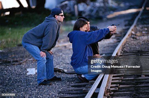 teens aiming gun - members of parliament address the nation following new zealand general election stockfoto's en -beelden