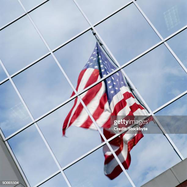 reflection of american flag - reflection foto e immagini stock