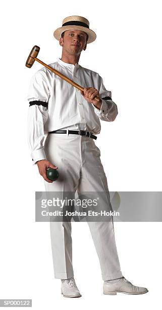 man with croquet ball and mallet - krocketklubba bildbanksfoton och bilder