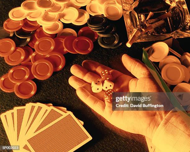 gambling hand - david wish stock pictures, royalty-free photos & images
