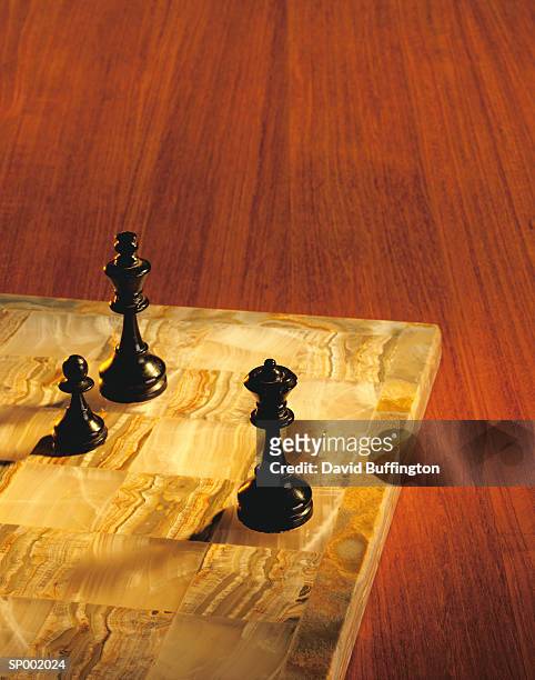 chess pieces on a chessboard - king and queen of norway celebrate their 80th birthdays banquet at the opera house day 2 stockfoto's en -beelden
