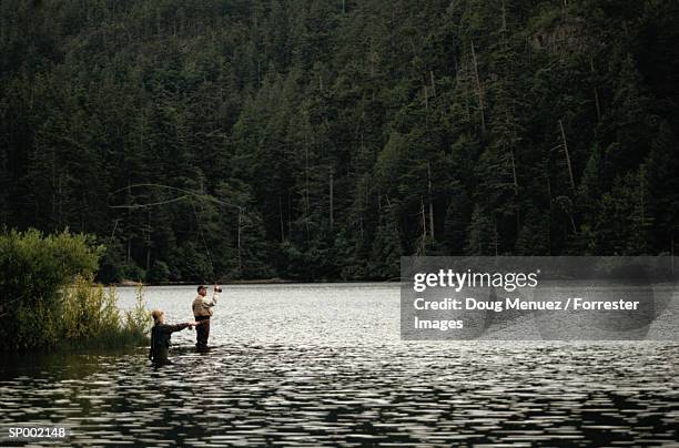 fly fishing - fiskeväst bildbanksfoton och bilder