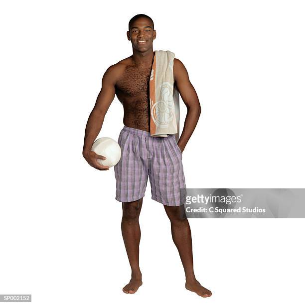 man holding a volleyball - black people in bathing suits stock pictures, royalty-free photos & images
