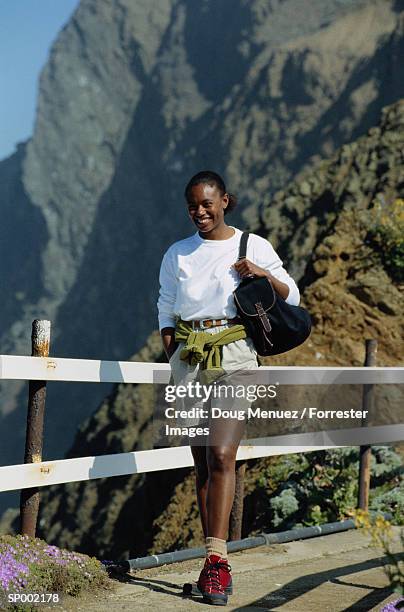 woman hiking - beige shorts stock pictures, royalty-free photos & images