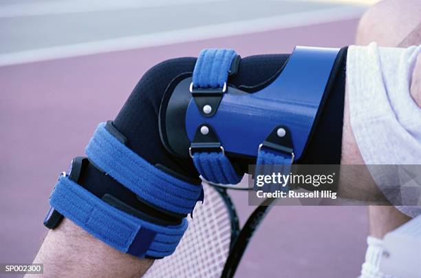 athletic knee brace - knee brace stock pictures, royalty-free photos & images