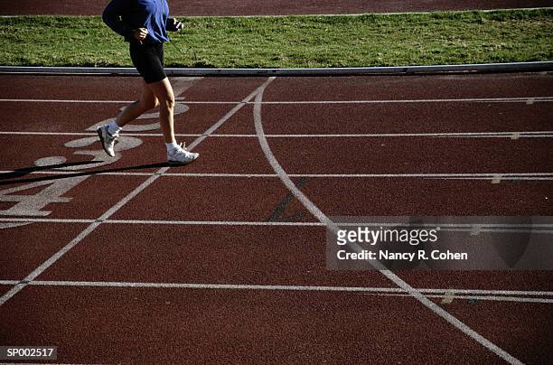 running at the race track - pharrell williams of n e r d sighting in new york ctiy stockfoto's en -beelden