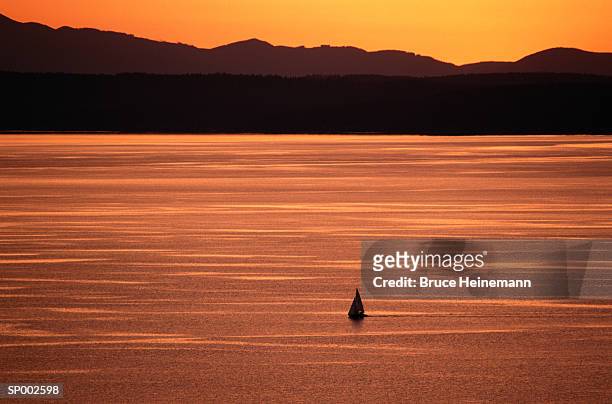 sailboat on the water - north pacific ocean stock pictures, royalty-free photos & images