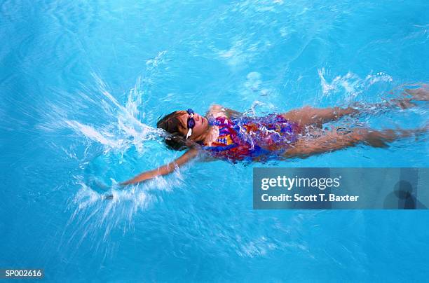 girl backstroking in pool - scott stock pictures, royalty-free photos & images