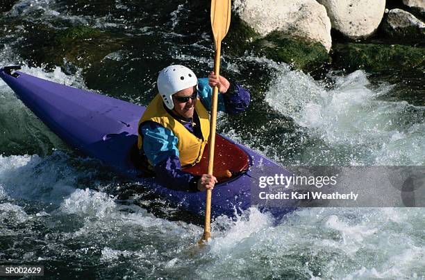 man kayaking - marine safety equipment stock pictures, royalty-free photos & images