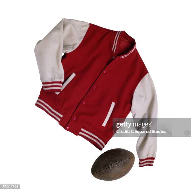 lettermans jacket and football - varsity jacket stockfoto's en -beelden