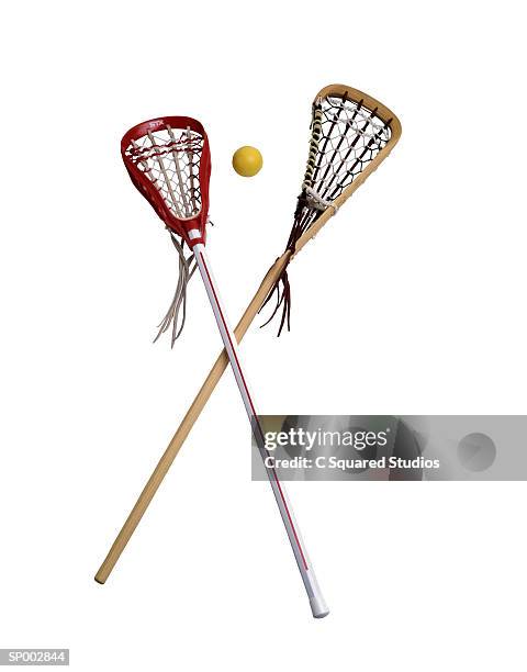 crosse and ball - lacrosse stick stock pictures, royalty-free photos & images