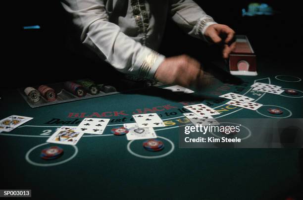 blackjack game - casino worker ストックフォトと画像