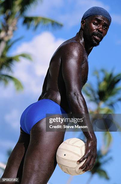 man with volleyball - black men in speedos - fotografias e filmes do acervo