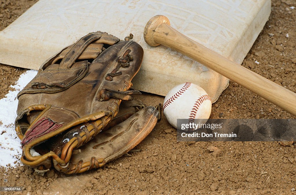 Baseball, Mitt, and Bat on Base