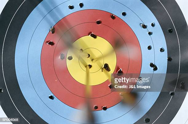 arrows in target - off target stock pictures, royalty-free photos & images