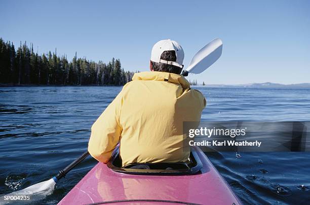 back of kayaker - north pacific ocean stockfoto's en -beelden