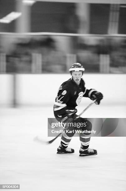 ice hockey player - ice hockey uniform stock pictures, royalty-free photos & images