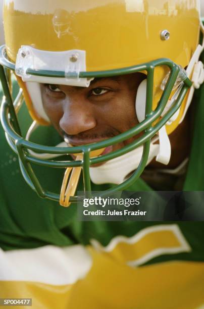 close-up of football player - american football uniform stock pictures, royalty-free photos & images