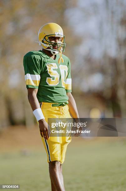 football player patience - american football uniform stock pictures, royalty-free photos & images