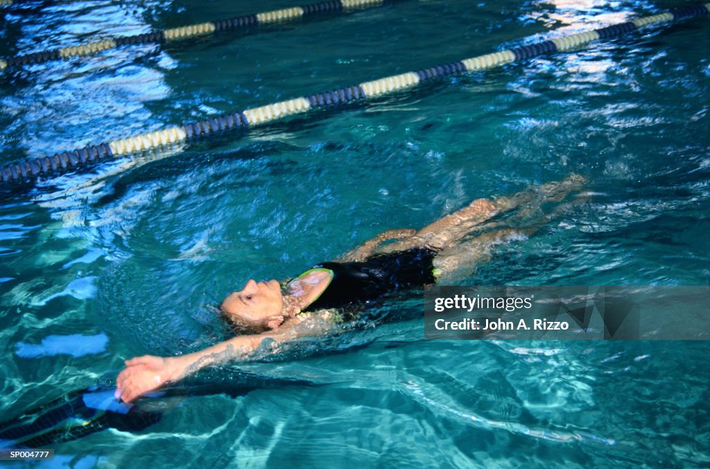 Backstroke Images Woman Doing Backstroke In Swimming Pool High-Res Stock Photo - Getty Images