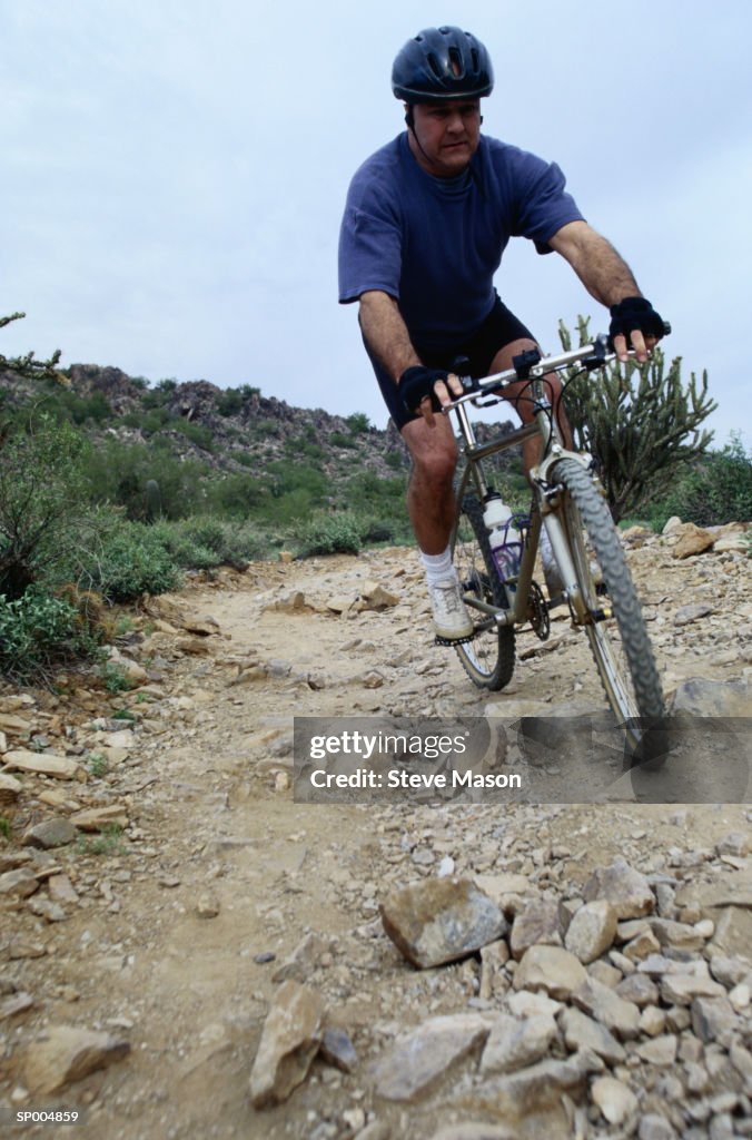 Man Riding Mountain Bike