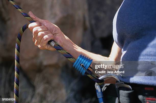 close-up of rock climbing rope - brian may signs copies of we will rock you at virigin megastore september 28 2004 stockfoto's en -beelden