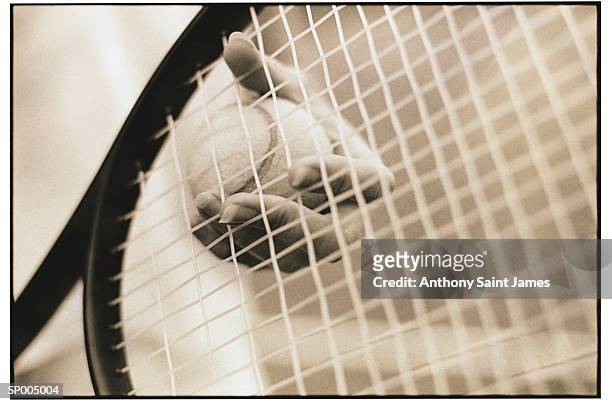 close-up with hand, tennis ball and racket - tennis raquet close up photos et images de collection